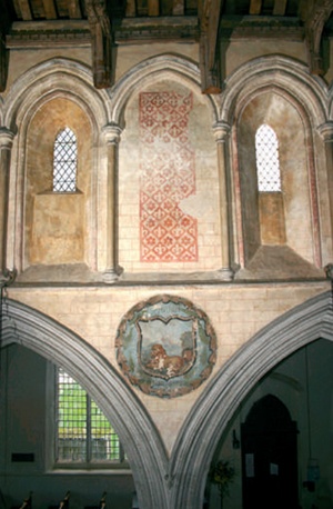Rectangular wall painting between clerestorey windows with alternating rows of flower heads and fleur de lis