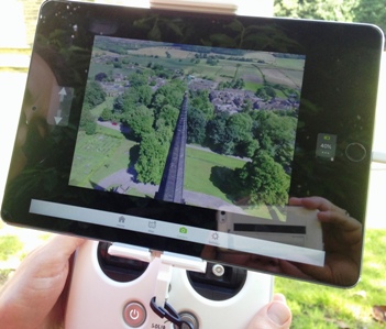 Hand-held drone controller with tablet attached